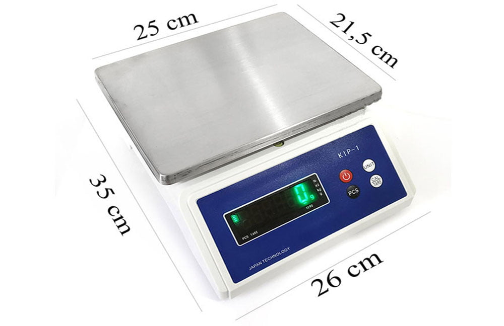 Cân điện tử mặt inox trắng, màn hình xanh, đo lường chính xác.