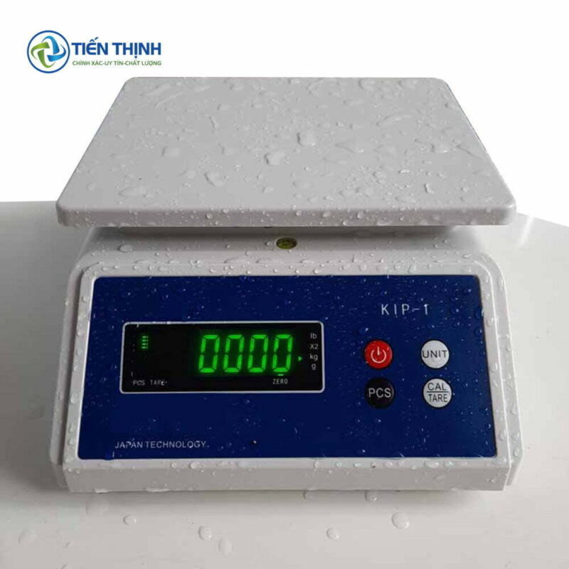 Cân điện tử KIP-T màu trắng, màn hình xanh, hiện số 00000.