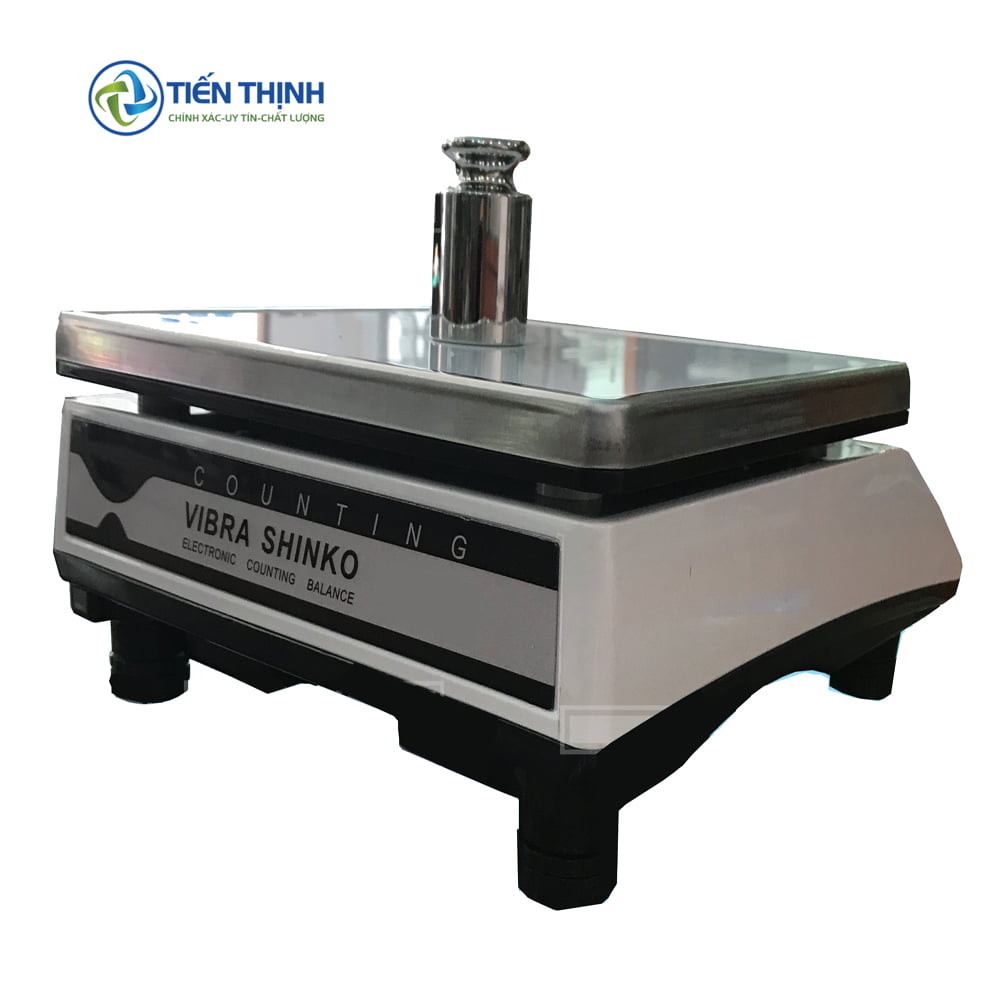 Cân đếm điện tử Vibra Shinko trắng đen, dùng trong công nghiệp và thương mại.