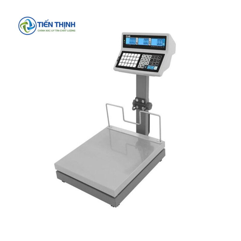 Cân điện tử có màn hình hiển thị số và bàn phím, dùng trong cửa hàng.