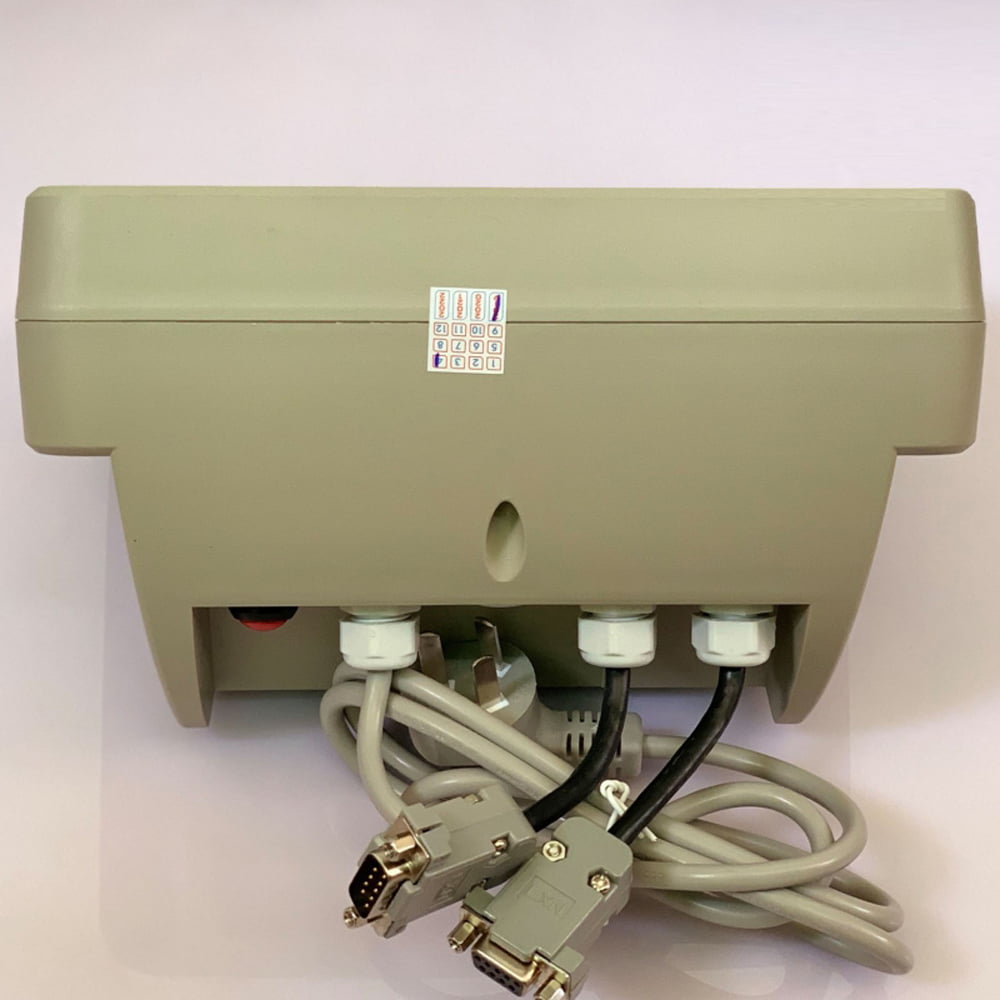 Thiết bị điện tử màu xám với các cổng kết nối ở mặt sau.