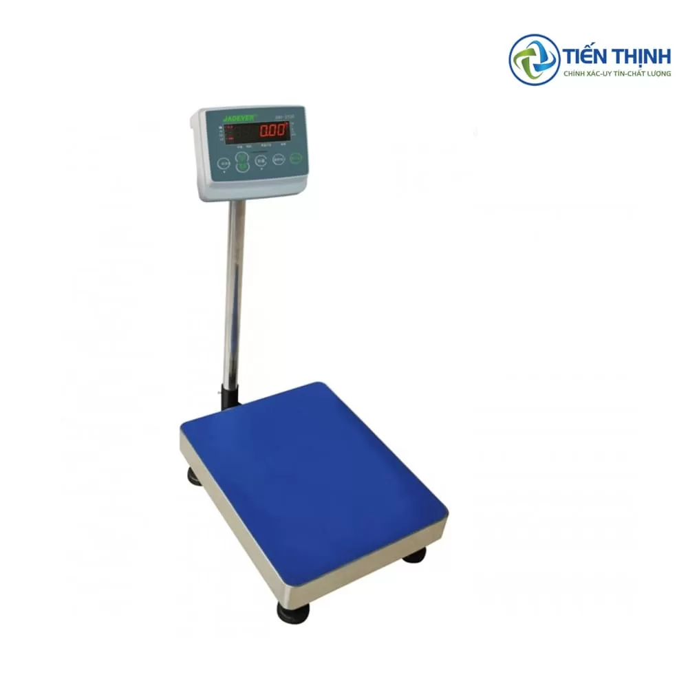 Cân điện tử nền vuông màu xanh, màn hình số hiển thị rõ ràng.