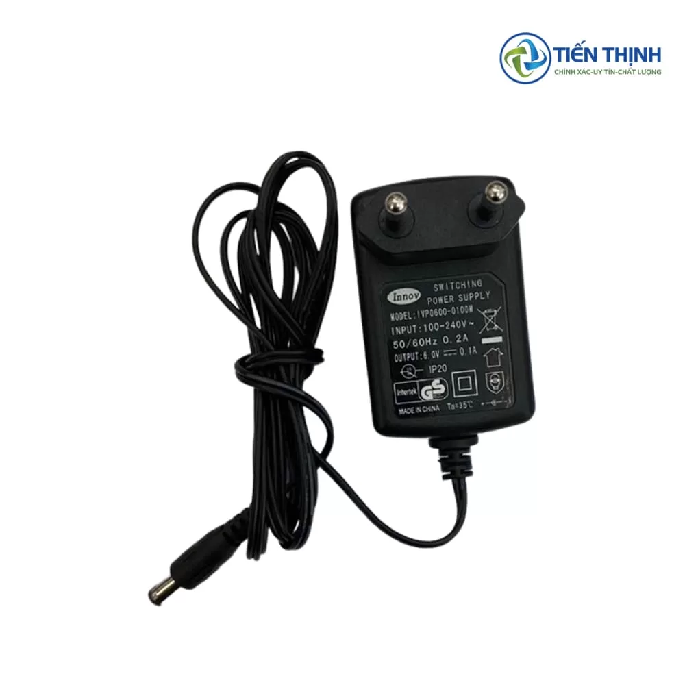 Bộ sạc điện thoại nhỏ gọn, đen, có dây cáp và thông số kỹ thuật.