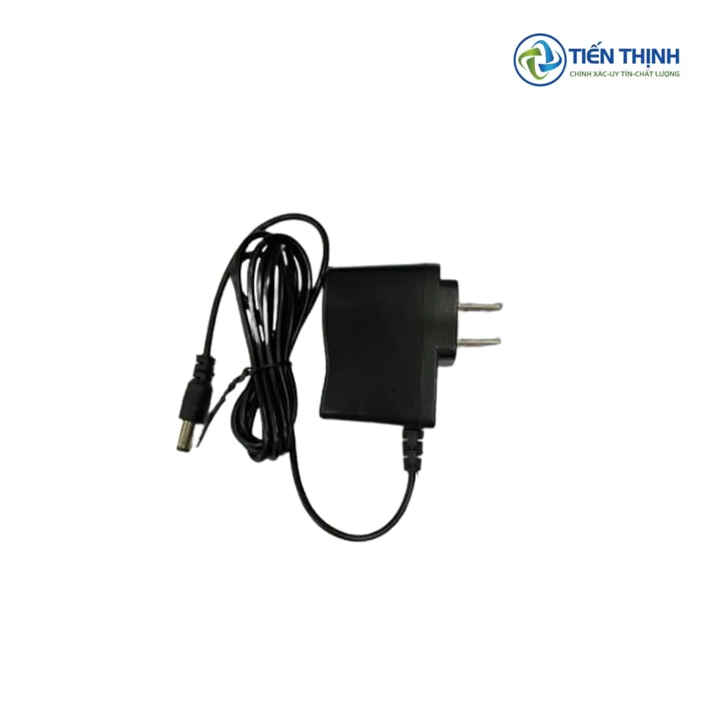 Bộ sạc điện màu đen, chân cắm dẹt, dây đen xoắn.
